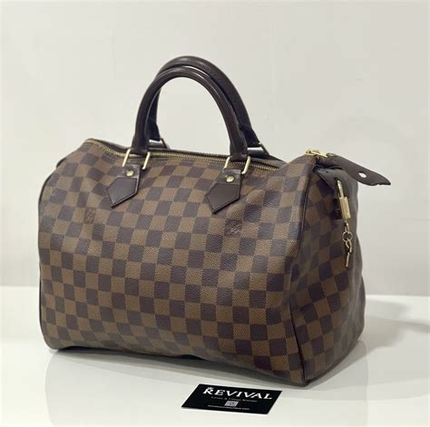 lucchetto louis vuitton rovinato|Speedy cloth handbag Louis Vuitton White in Cloth .